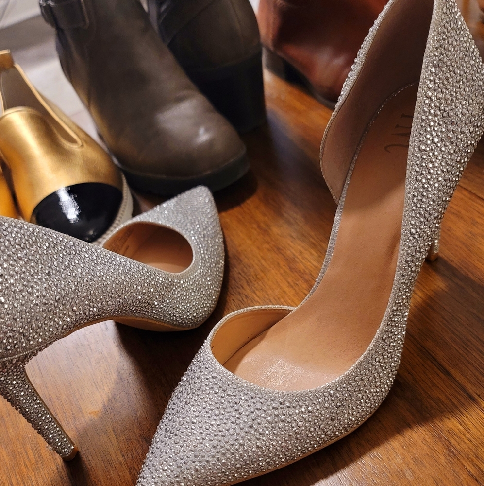 Silver sparkle I.N.C size 10.5 high heels. 4 inches